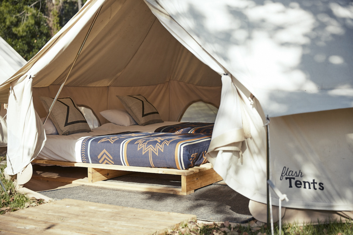 Flash Camp's spacious canvas Flash tents are furnished with a comfy double bed, or pair of singles.